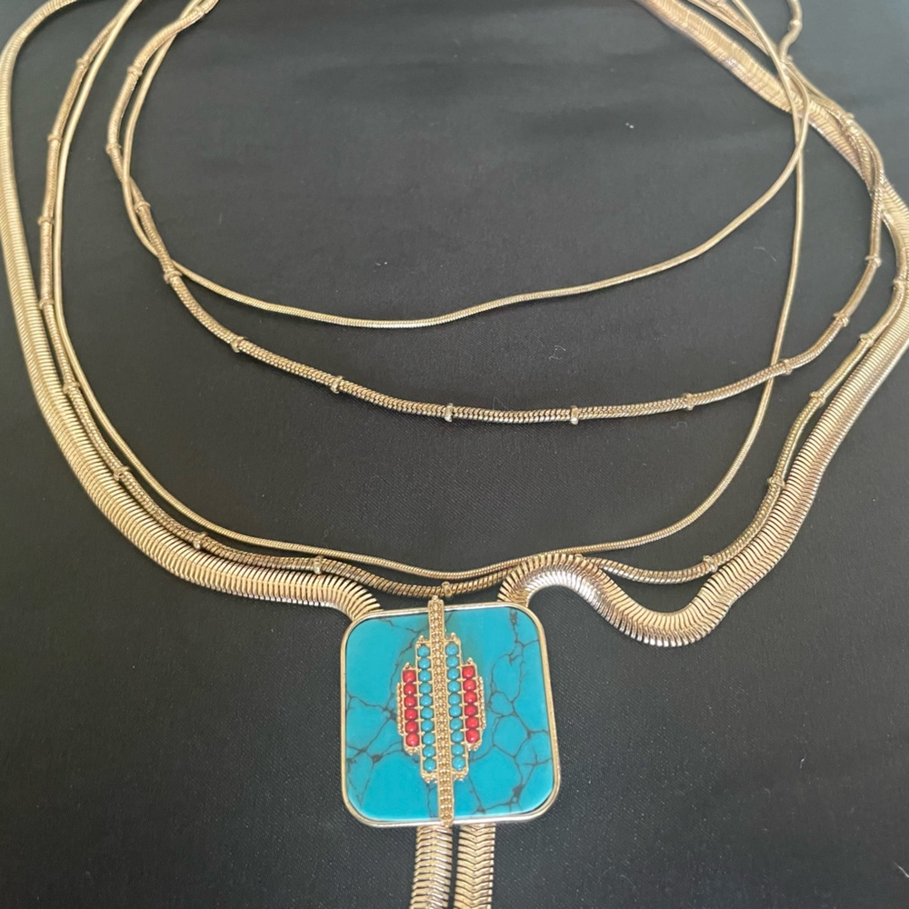 Layered gold, tribal Steve Madden necklace